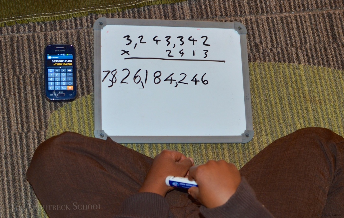 4 digit multiplication using the Montessori checker board